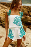 Shorts Off White com bordado Turquesa