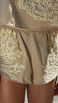 Stories de Shorts Areia com bordado Bege